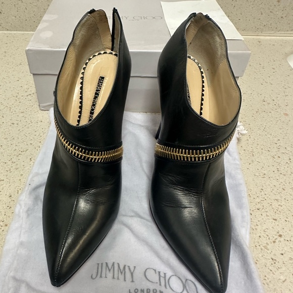 Jimmy Choo Black Ankle boots with gold zipper sz 37 1/2